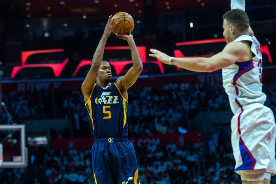 Chris Detrick  |  The Salt Lake Tribune
Utah Jazz guard Rodney Hood (5) shoots past LA Clippers forward Blake Griffin (32) during Game 1 of the Western Conference at the Staples Center Saturday, April 15, 2017.  Utah Jazz defeated LA Clippers 97-95.