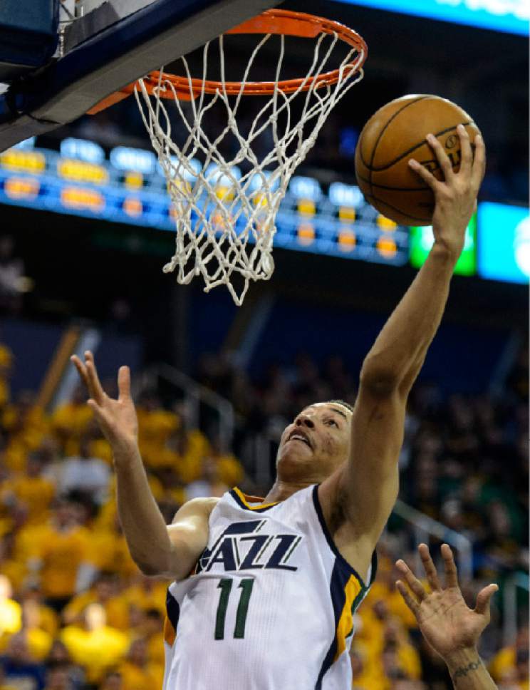 Steve Griffin  |  The Salt Lake Tribune


Utah Jazz guard Dante Exum (11) gets to the basket during game 4 of the NBA playoff game between the Utah Jazz and the Golden State Warriors at Vivint Smart Home Arena in Salt Lake City Monday May 8, 2017.