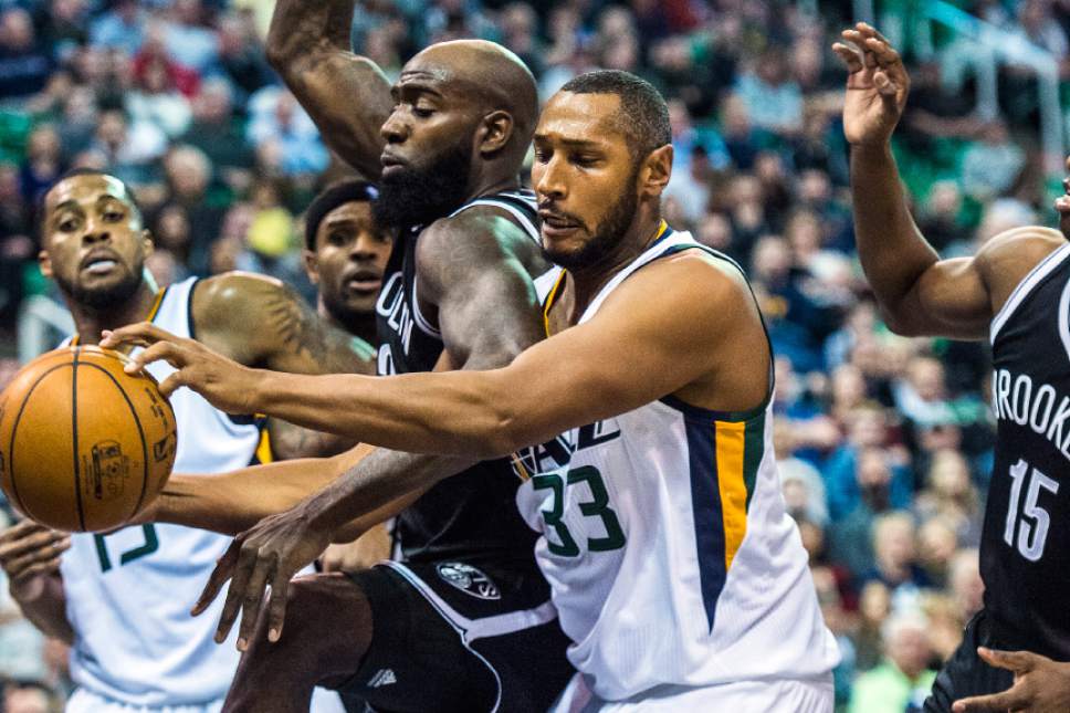 Chris Detrick  |  The Salt Lake Tribune
Brooklyn Nets forward Quincy Acy (13) and Utah Jazz center Boris Diaw (33) go for the ball during the game at Vivint Smart Home Arena Friday March 3, 2017. Utah Jazz defeated Brooklyn Nets 112-97.