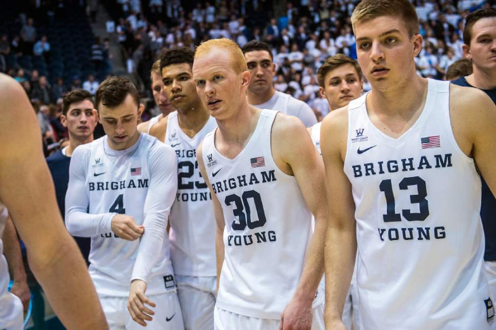 Chris Detrick  |  The Salt Lake Tribune
Brigham Young Cougars guard Nick Emery (4) Brigham Young Cougars forward Yoeli Childs (23) Brigham Young Cougars guard TJ Haws (30) and Brigham Young Cougars guard Colby Leifson (13) after the game at the Marriott Center Friday February 3, 2017. Gonzaga Bulldogs defeated Brigham Young Cougars 85-75.