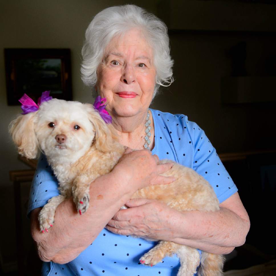 Trent Nelson  |  The Salt Lake Tribune
Woodine DeMille, at age 83, is having her first art show at the Old Dome Meeting Hall in Riverton on July 17-Aug. 16. Her family describes her as living proof that dreams can come true at any age. DeMille was photographed at her Riverton home with her dog Ginger on Tuesday, July 11, 2017.