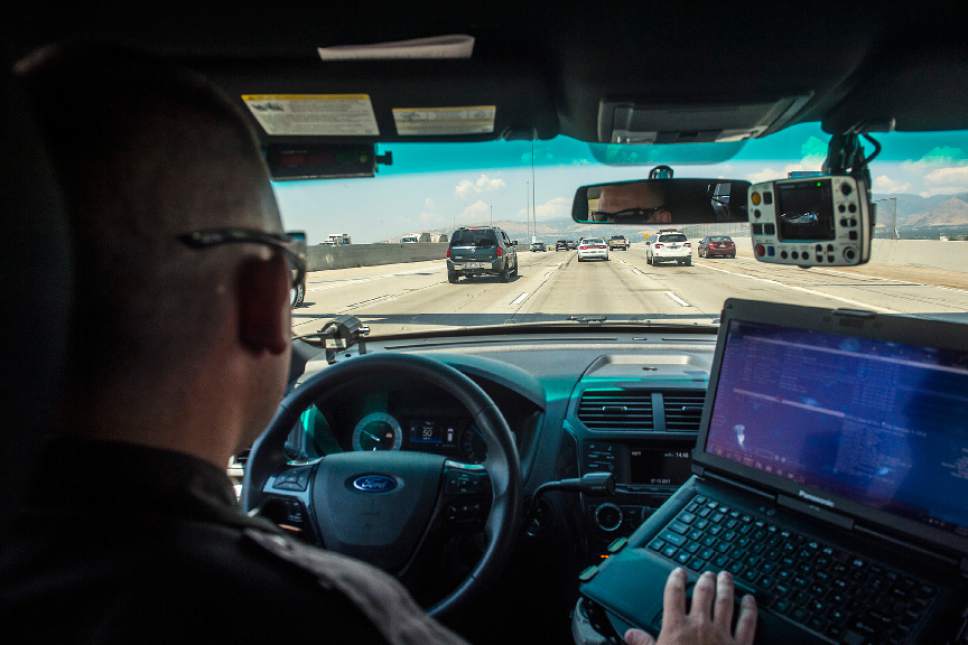 Chris Detrick  |  The Salt Lake Tribune
Utah Highway Patrol Trooper Derek Shelby looks for distracted drivers on Interstate 15 Thursday, July 13, 2017.