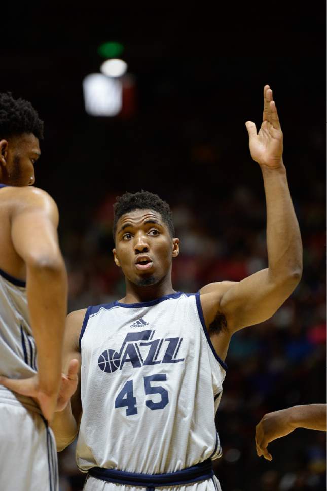 Francisco Kjolseth | The Salt Lake Tribune
Donovan Mitchell of the Utah Jazz talks with teammates as they take on the Boston Celtics during the NBA Summer league basketball game at the Huntsman Center, July 6, 2017, in Salt Lake City.