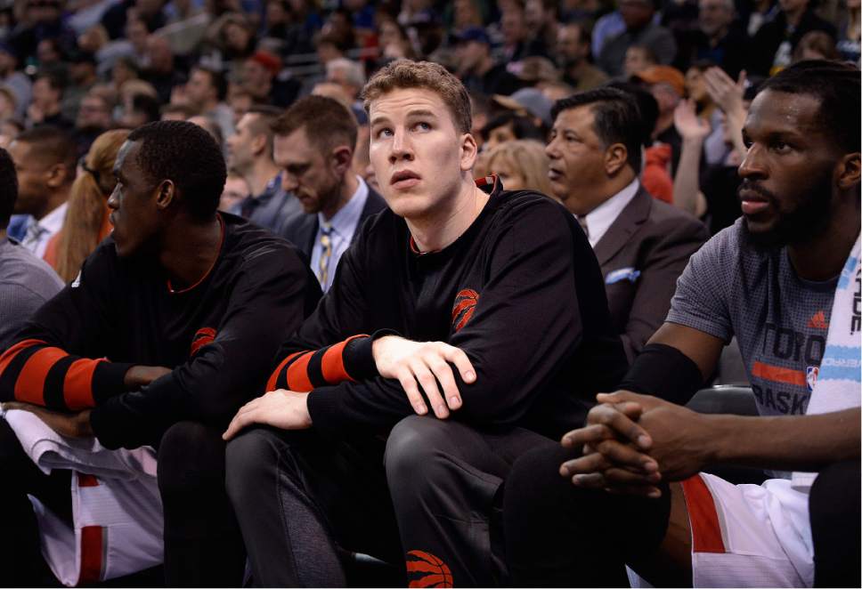 Scott Sommerdorf   |  The Salt Lake Tribune  
Toronto Raptors center and former Utah Ute Jakob Poeltl (42) sits at the end of the Toronto bench during second half play. Poeltl did not see any playing time as the Toronto Raptors beat the Jazz 104-98, Friday, December 23, 2016.