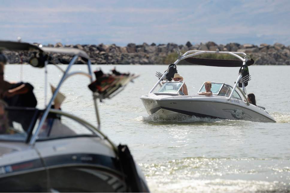 Scott Sommerdorf   |  The Salt Lake Tribune  
Boats return to the marina near Utah Lake State Park, Friday, July 14, 2017.