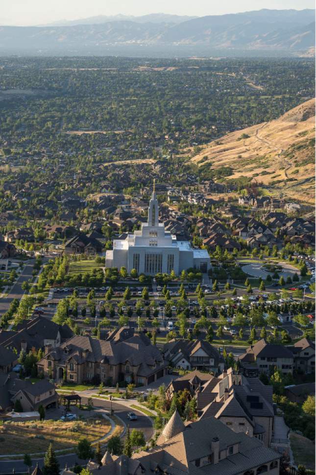 Leah Hogsten  |  The Salt Lake Tribune
Draper's LDS temple, shown June 14, is one of four such Mormon edifices in southern Salt Lake County. Utah's most populous county is becoming less-LDS, according to church statistics, while neighboring Utah County, which has four Mormon temples and plans for a fifth, is growing more LDS. In fact, Utah County, though significantly smaller in overall population than its northern neighbor, soon may pass Salt Lake County in Mormon membership.