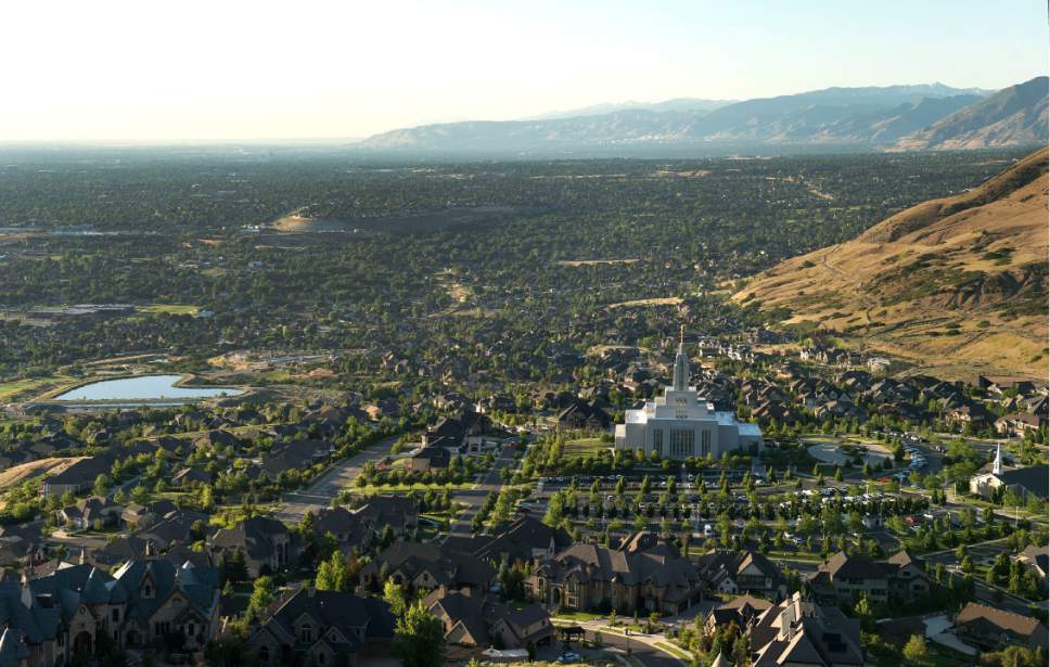 Leah Hogsten  |  The Salt Lake Tribune
Draper's LDS temple, shown June 14, is one of four such Mormon edifices in southern Salt Lake County. Utah's most populous county is becoming less-LDS, according to church statistics, while neighboring Utah County, which has four Mormon temples and plans for a fifth, is growing more LDS. In fact, Utah County, though significantly smaller in overall population than its northern neighbor, soon may pass Salt Lake County in Mormon membership.