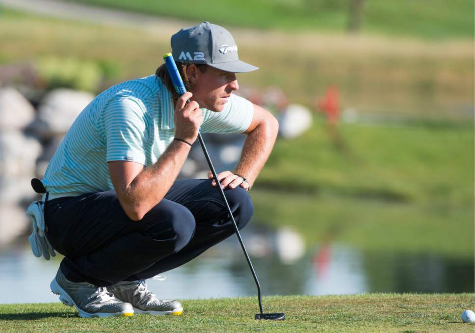 Rick Egan  |  The Salt Lake Tribune

Christian Brand looks over a putt in the Utah Championship golf tournament, at Oakridge Country Club, Friday, July 14, 2017.