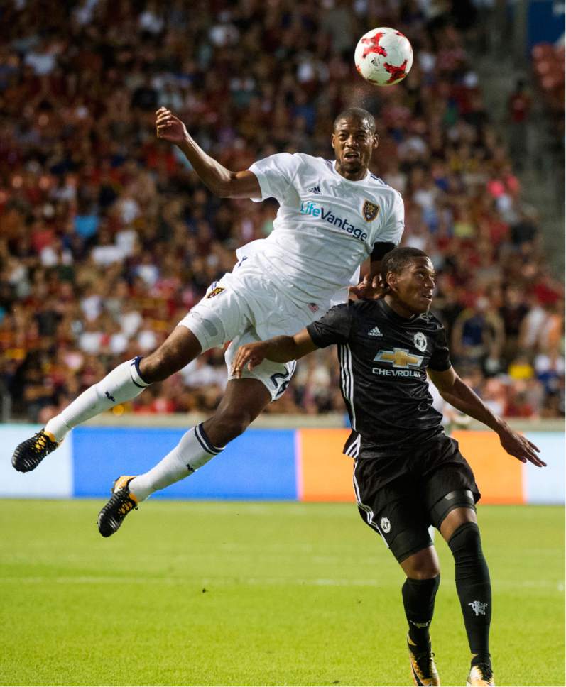Rick Egan  |  The Salt Lake Tribune

Real Salt Lake defender Chris Schuler (28) goes for the ball along with Manchester United forward Anthony Martial (11), as Real Salt Lake played Manchester United in a friendly game at Rio Tinto Stadium, Monday, July 17, 2017.
