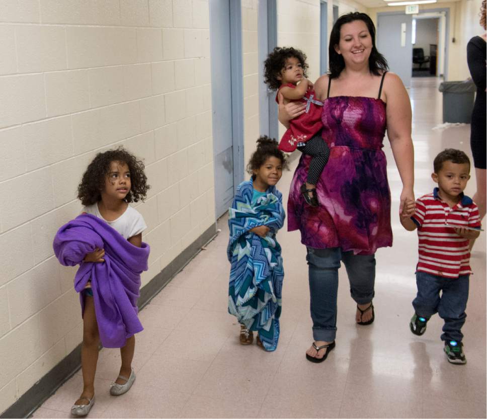 Rick Egan  |   Tribune file photo

Justina Shields, with her children Maliha, left, Laila, Averyonna and William at the Road Home, Thursday, July 13, 2017.