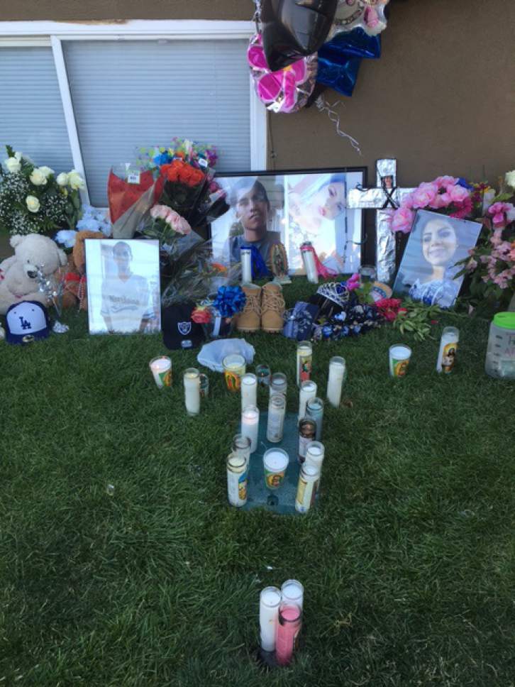 Mariah Noble  |  The Salt Lake Tribune

People morn for siblings Jose and Abril Izazaga who died Wednesday, July 6 after they were shot outside the Mill Creek II Apartments complex in Midvale, Utah.