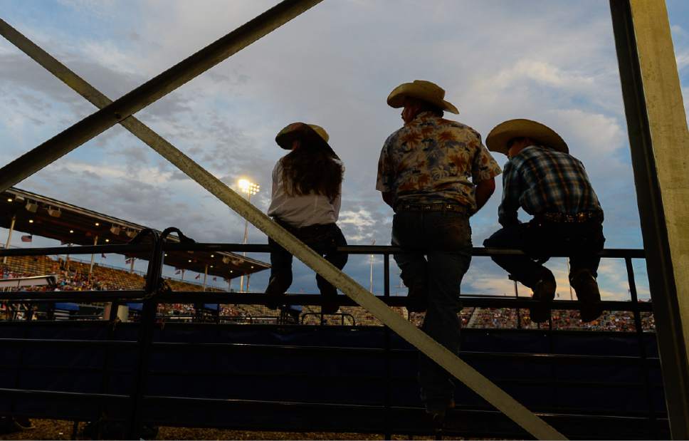 Francisco Kjolseth | The Salt Lake Tribune
Dave Teichert of Cokeville, WY, is joined by his kids Kayla and Wes as they take a break from volunteering at the new 10,000-seat Fairpark Arena on day two of the Days of '47 Rodeo in its new home in Salt Lake City on Thursday, July 20, 2017.