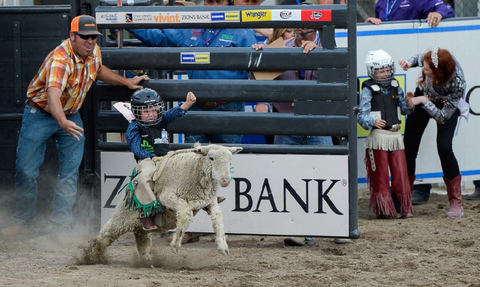 Francisco Kjolseth | The Salt Lake Tribune
Young mutton busters test themselves on day two of the Days of '47 Rodeo in its new home in Salt Lake City on Thursday, July 20, 2017.