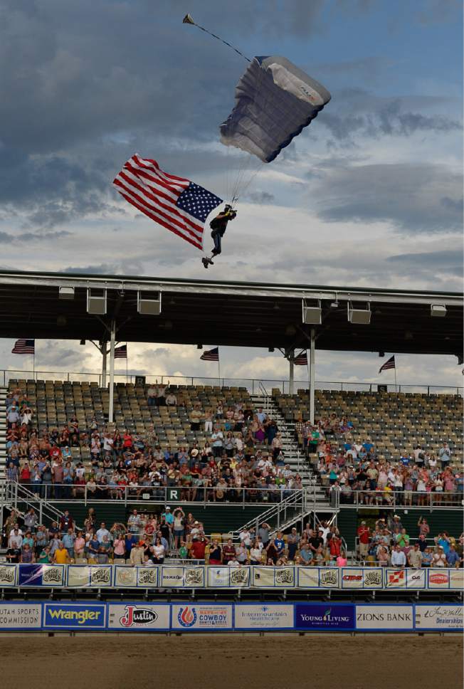 Francisco Kjolseth | The Salt Lake Tribune
The American flag parachutes into the new 10,000-seat Fairpark Arena on day two of the Days of '47 Rodeo in its new home in Salt Lake City on Thursday, July 20, 2017.