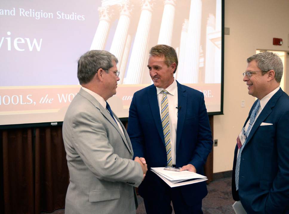 Al Hartmann  |  The Salt Lake Tribune


Gordon Smith, Dean of BYU Law School, left, greets Arizona Sen. Jeff Flake, center, and Jeff Scharffs, Director of the International Center for Law and Religion Studies, right. at the Religious Freedom Annual Review at Brigham Young University on Thursday, July 6, 2017.