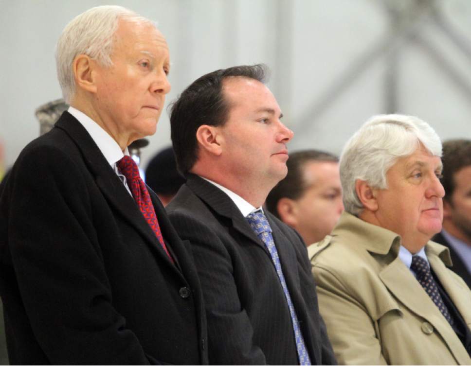 Rick Egan  | Tribune file photo

In this January 11, 2013, file photo, Senators Orrin Hatch, Mike Lee and Congressman Rob Bishop stand at attention during the change of command ceremony for  Col. Kathryn L. Kolbe  at Hill Air Force Base.