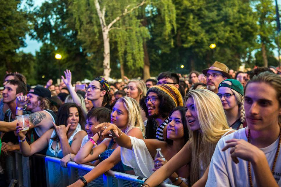 Chris Detrick  |  The Salt Lake Tribune
Audience members watch as Little Dragon performs during the opening night of the 30th annual Salt Lake City Twilight Concert Series in Pioneer Park Thursday, July 20, 2017.