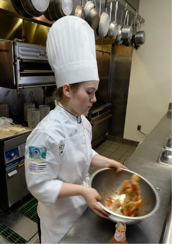 Francisco Kjolseth | The Salt Lake Tribune
Madeline Black, a 19 year old Utah Valley University culinary student, tosses dumplings as she prepares for a public luncheon recently. Black won the top honor for a student chef last week from the American Culinary Federation's Student Chef of the Year. She is the second UVU student to win the title in the last two years and one of about six students to get to nationals int he last decade.