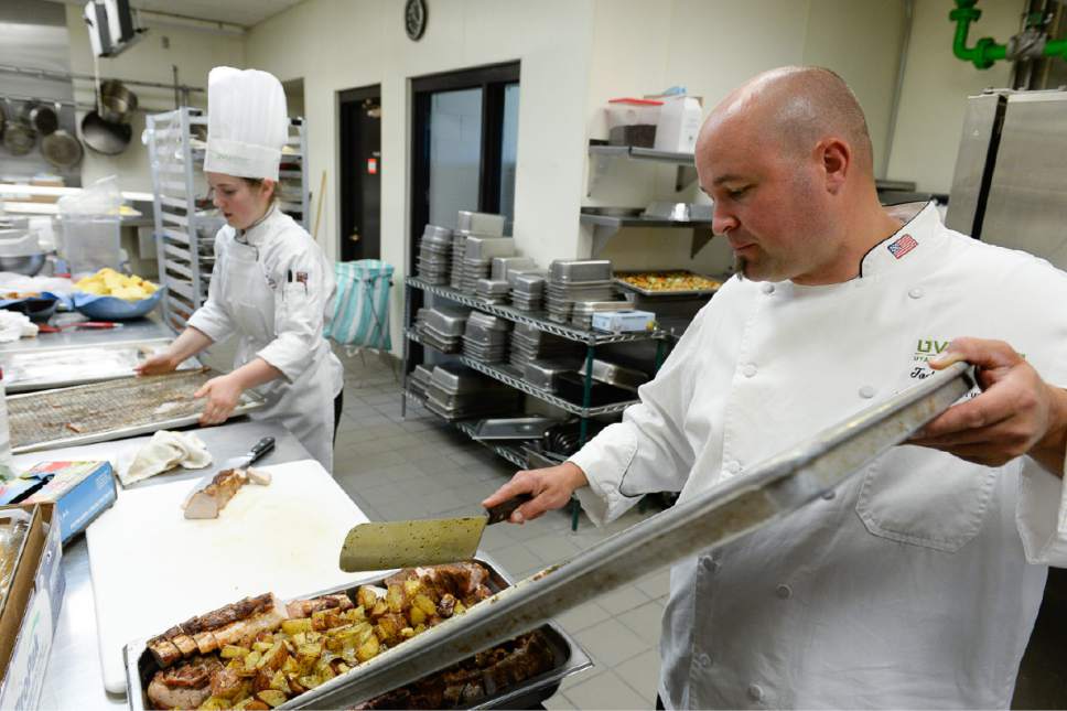 Francisco Kjolseth | The Salt Lake Tribune
Cheff Todd Leonard guides Madeline Black, as she works an event through UVU's student run restaurant called Restaurant Forte. Black won the top honor for a student chef last week from the American Culinary Federation's Student Chef of the Year.