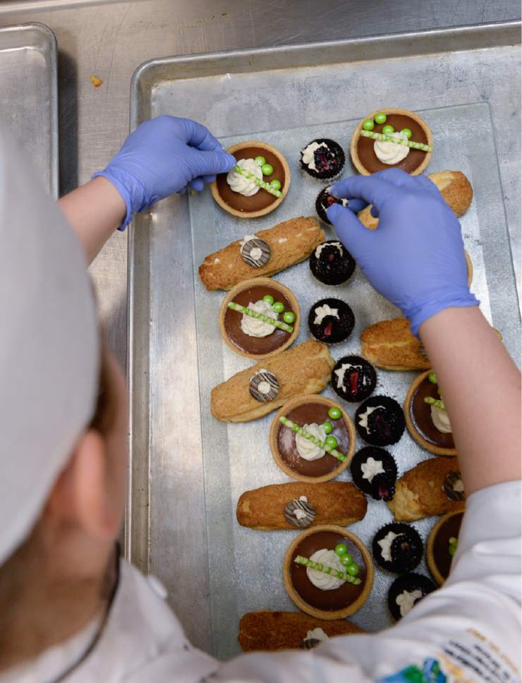 Francisco Kjolseth | The Salt Lake Tribune
Constantly practicing, Madeline Black, a 19 year old Utah Valley University culinary student puts the finishing touches on deserts while working an event through UVU's student run restaurant called Restaurant Forte.