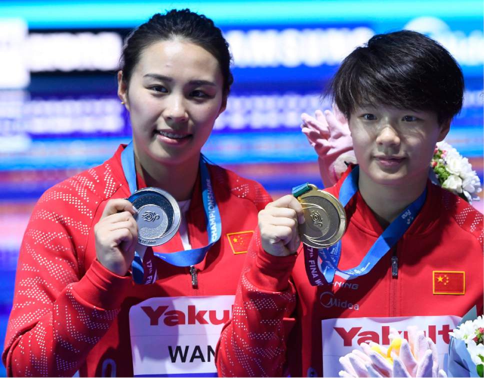 China, Russia grab golds again in diving, synchro at ...