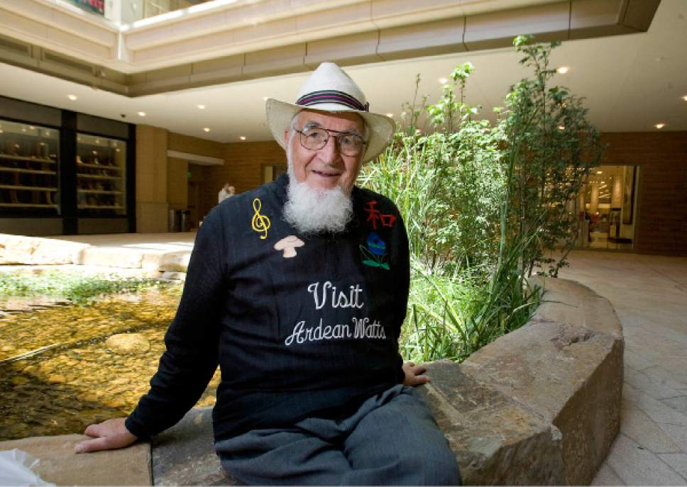 |  Tribune file photo

In this May 14, 2012, file photo, former assistant director of the Utah Symphony, Ardean Watts wears a shirt  with the message," Visit Ardean Watts", inviting  visitors to the mall to engage with him  in conversation.