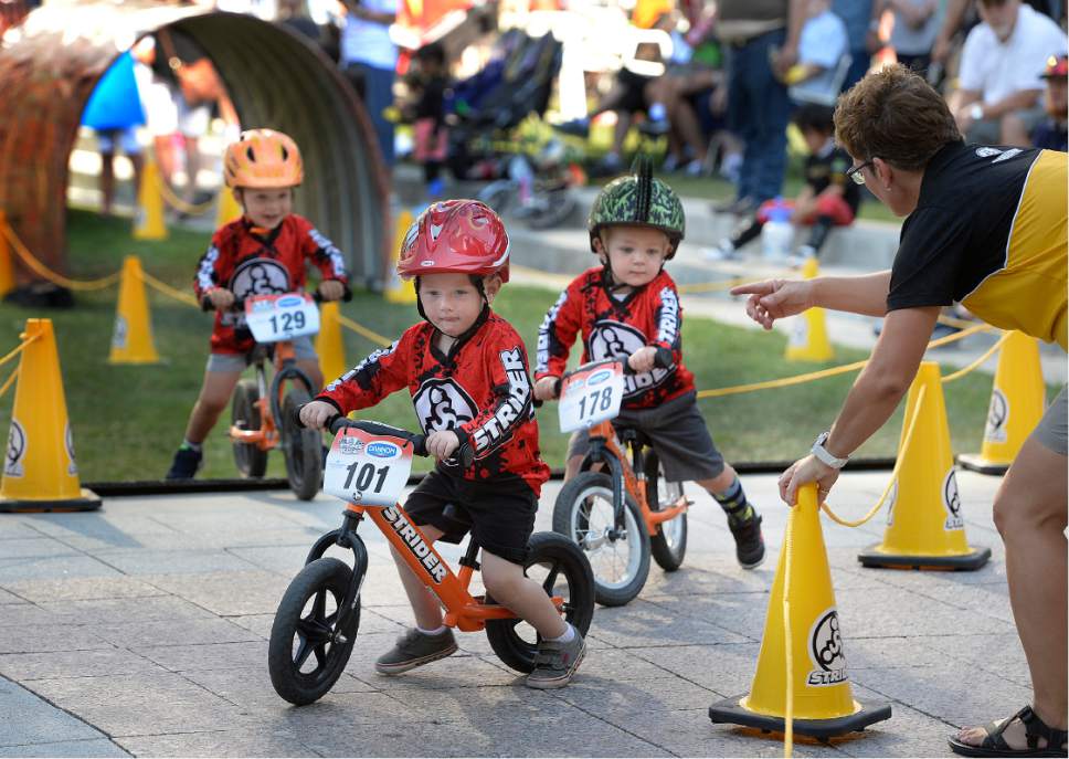 Scott Sommerdorf   |  The Salt Lake Tribune  
Some two year old riders had to be reminded which way to go during their race at the Strider World Championships, held at the Gallivan Center, Saturday, July 22, 2017.