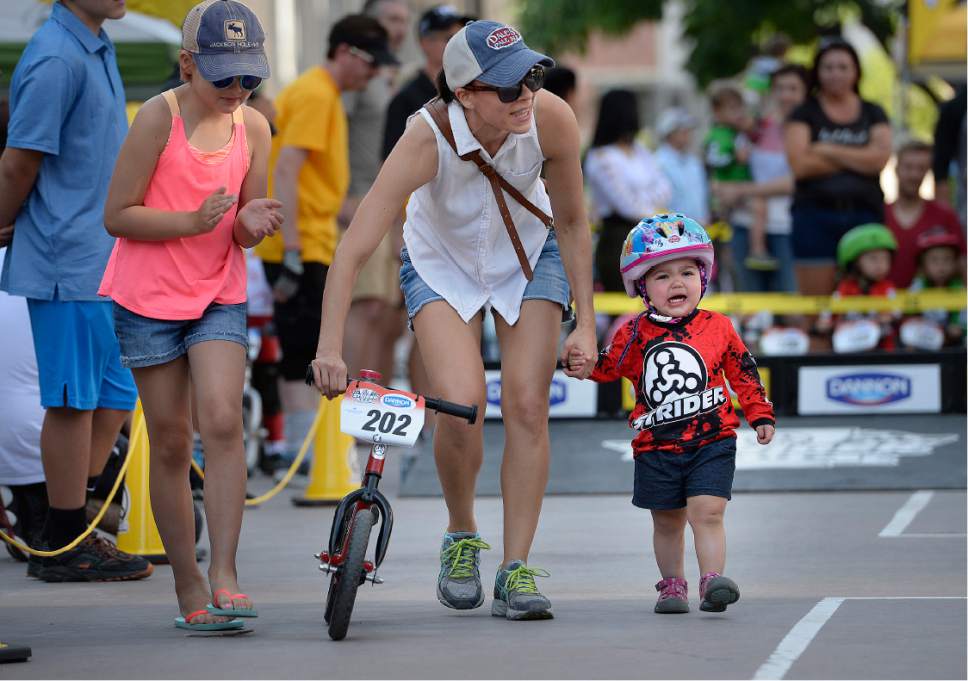 Scott Sommerdorf   |  The Salt Lake Tribune  
Two year Matilda Page of Salt Lake City, needed a little help to get going in her heat race at the Strider World Championships, held at the Gallivan Center, Saturday, July 22, 2017.