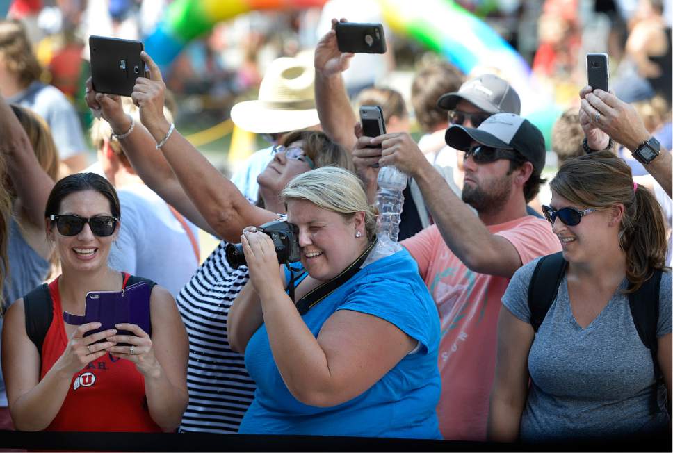 Scott Sommerdorf   |  The Salt Lake Tribune  
Parents and family members eagerly make photos of their winning drivers in the award area at the Strider World Championships, held at the Gallivan Center, Saturday, July 22, 2017.