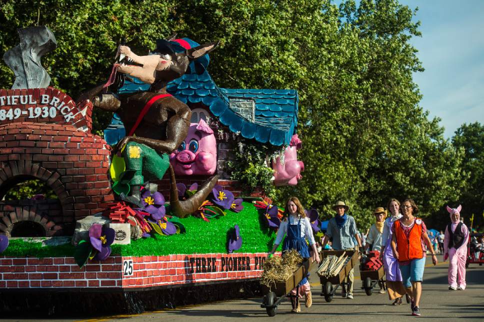 Chris Detrick  |  The Salt Lake Tribune
Members of the Bountiful South Stake walk with their float during the 65th annual Bountiful Handcart Days Grand Parade Friday, July 21, 2017.