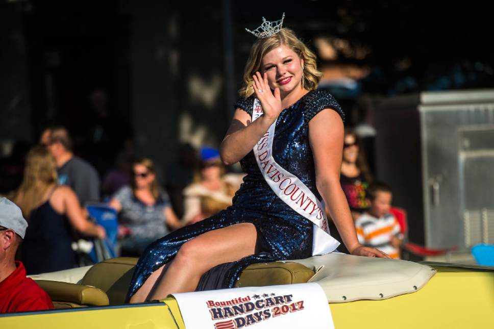 Chris Detrick  |  The Salt Lake Tribune
Miss Davis County Samantha Eubank waves to the crowd during the 65th annual Bountiful Handcart Days Grand Parade Friday, July 21, 2017.