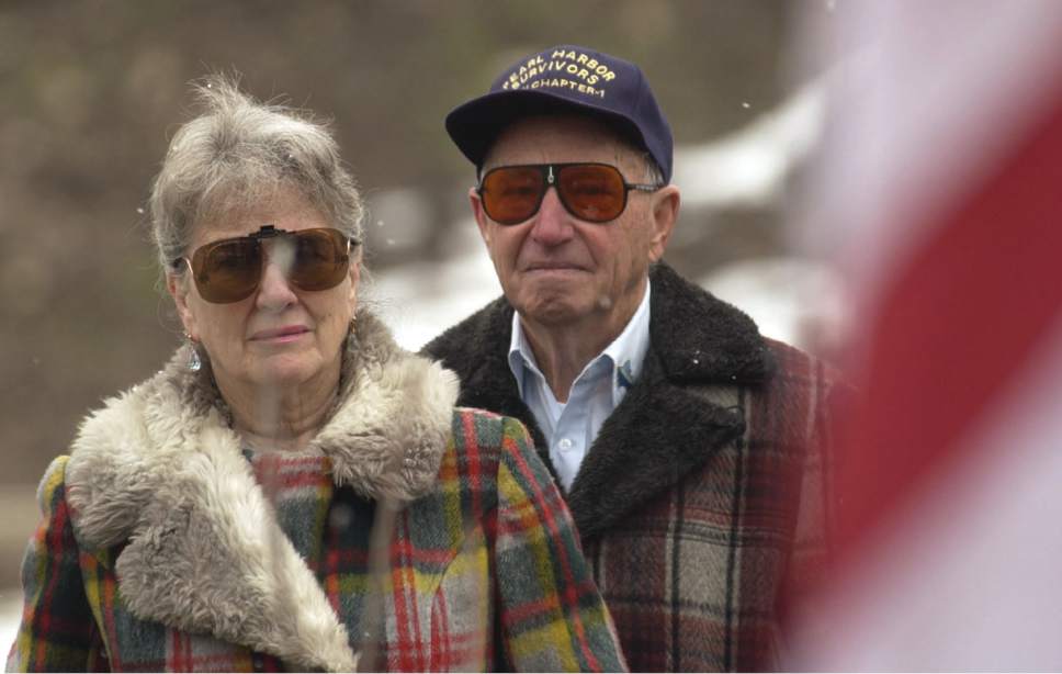 Al Hartmann  |  Tribune file photo
Pearl harbor survivor Ken Potts, right , with his wife Doris Potts listens in 2001 to words honoring sailors killed at Pearl harbor at a ceremony at Memory Grove Park.