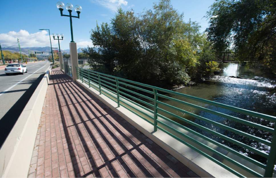 Steve Griffin  |  The Salt Lake Tribune

A pedestrian bridge crosses the Jordan River near North Temple in Salt Lake City, Friday, October 30, 2015.  Currently the trail is unfinished between 200 S and North Temple. A detour route takes the trail over to 1000 West and back up North Temple where the trail is complete.