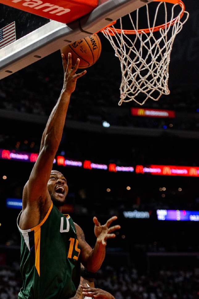 Trent Nelson  |  The Salt Lake Tribune
Utah Jazz forward Derrick Favors (15) shoots as the Utah Jazz face the Los Angeles Clippers in Game 7 at STAPLES Center in Los Angeles, California, Sunday April 30, 2017.
