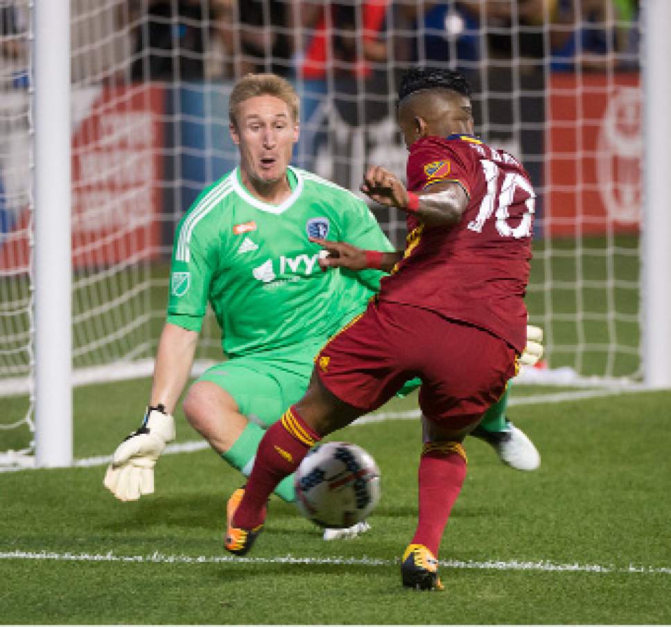 Michael Mangum  |  Special to the Tribune

Real Salt Lake forward Joao Plata (10) tries to get a shot on Sporting Kansas City goalkeeper Tim Melia (29) during their match at Rio Tinto Stadium in Sandy, UT on Saturday, July 22, 2017.