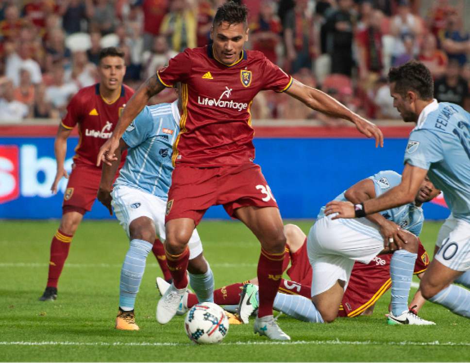 Michael Mangum  |  Special to the Tribune

Real Salt Lake defender Marcelo Silva (30) tries to get a shot with heavy pressure from the Sporting Kansas City defense during their match at Rio Tinto Stadium in Sandy, UT on Saturday, July 22, 2017.