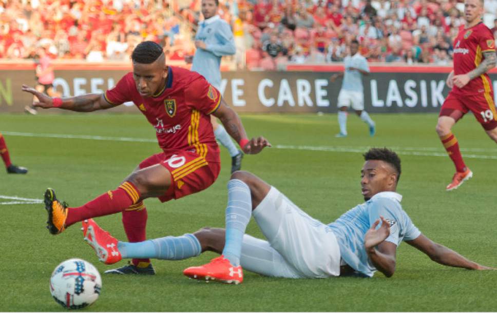 Michael Mangum  |  Special to the Tribune

Sporting Kansas City defender Saad Abdul-Salaam (17) slide tackles Real Salt Lake forward Joao Plata (10) inside the box to send the ball out of bounds during their match at Rio Tinto Stadium in Sandy, UT on Saturday, July 22, 2017.