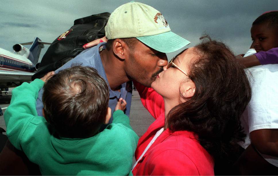 |  Tribune File Photo

Utah Jazz MVP Karl Malone is greeted by his wife Kay and his son Karl Jr. upon returning to Salt Lake City after losing to the Chicago Bulls in the 1997 NBA Finals.