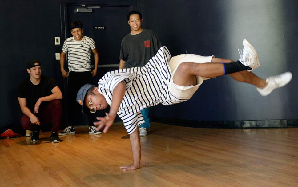 Al Hartmann  |  The Salt Lake Tribune
Sam Henry shows off his moves as a member of the BBoy Federation, a non-profit for Hip Hop Arts at an announcement of the line-up and headliners for the 2017 Urban Arts Festival (Sept. 16-17) held at the Gallivan Center.