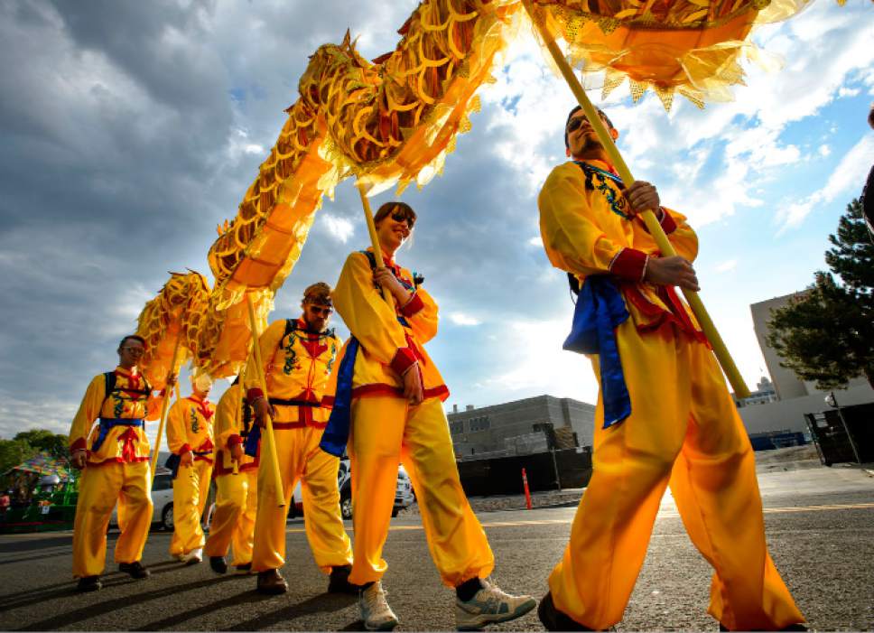 Steve Griffin  |  The Salt Lake Tribune


Members of the Chinese Society of Utah carry a dragon as the sun rises over the Wasatch Front prior to the start of the Days of '47 Parade in Salt Lake City on Monday, July 24, 2017.