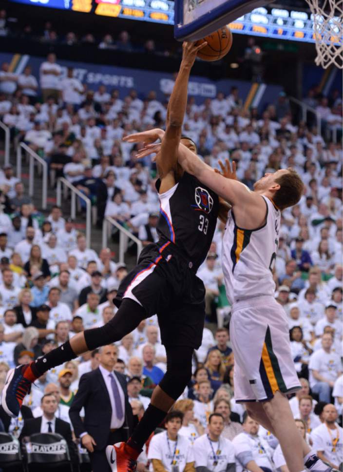 Steve Griffin  |  The Salt Lake Tribune


Utah Jazz forward Joe Ingles (2) fouls LA Clippers forward Wesley Johnson (33) as he goes to the basket during the Jazz versus Clippers NBA playoff game at Viviint Smart Home arena in Salt Lake City Sunday April 23, 2017.