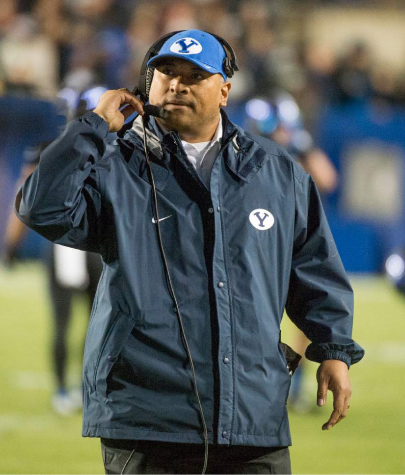 Rick Egan  |  The Salt Lake Tribune

Brigham Young Cougars head coach Kalani Sitake checks the scoreboard as BYU takes a big lead over USU, in the second half, in football action, BYU vs Utah State, at Lavell Edwards Stadium in Provo,  Saturday, November 26, 2016.