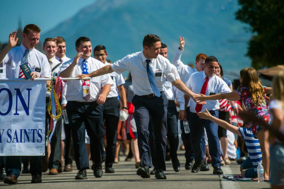 Chris Detrick  |  The Salt Lake Tribune
Missionaries with the Utah Orem Mission wave to the crowd during the annual Freedom Festival Grand Parade in downtown Provo Tuesday, July 4, 2017.