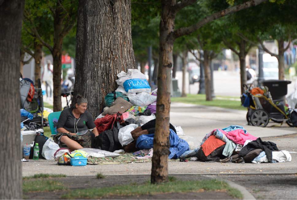 Francisco Kjolseth | The Salt Lake Tribune
Homeless gather for the day with their belongings at many small camps near the downtown shelter on Tuesday, July 25, 2017, as the conversation continues on how to address the ongoing homeless issue.