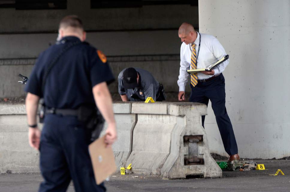 Al Hartmann  |  The Salt Lake Tribune
Salt Lake City police investigate homicide-assault crime scene near 500 S. 500 W. Tuesday July 25.