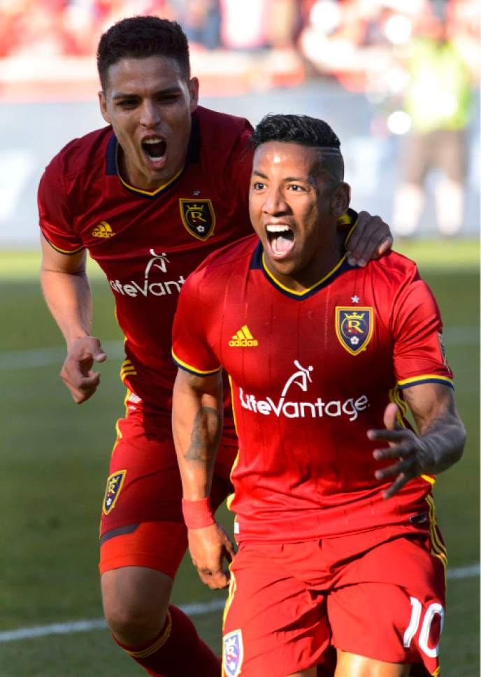 Steve Griffin  |  The Salt Lake Tribune



Real Salt Lake midfielder Luis Silva (20) grabs Real Salt Lake forward Joao Plata (10) as he screams with excitement after scoring a goal during the RSL vs. Philadelphia Union soccer match at Rio Tinto Stadium in Sandy Saturday May 27, 2017.