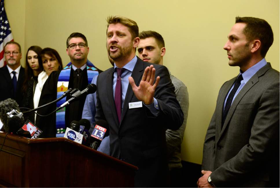 Scott Sommerdorf   |  The Salt Lake Tribune
Troy Williams, Executive Director at Equality Utah, speaks at a press conference organized as a response to the recent statement by the LDS Church to Senator Stephen Urquhart's SB107, Thursday, February 18, 2016. Williams made a point to send the message that he and the people who have backed SB107 will not go away, and will follow his teaching as an LDS missionary and "keep knocking on doors" to further the bill.
