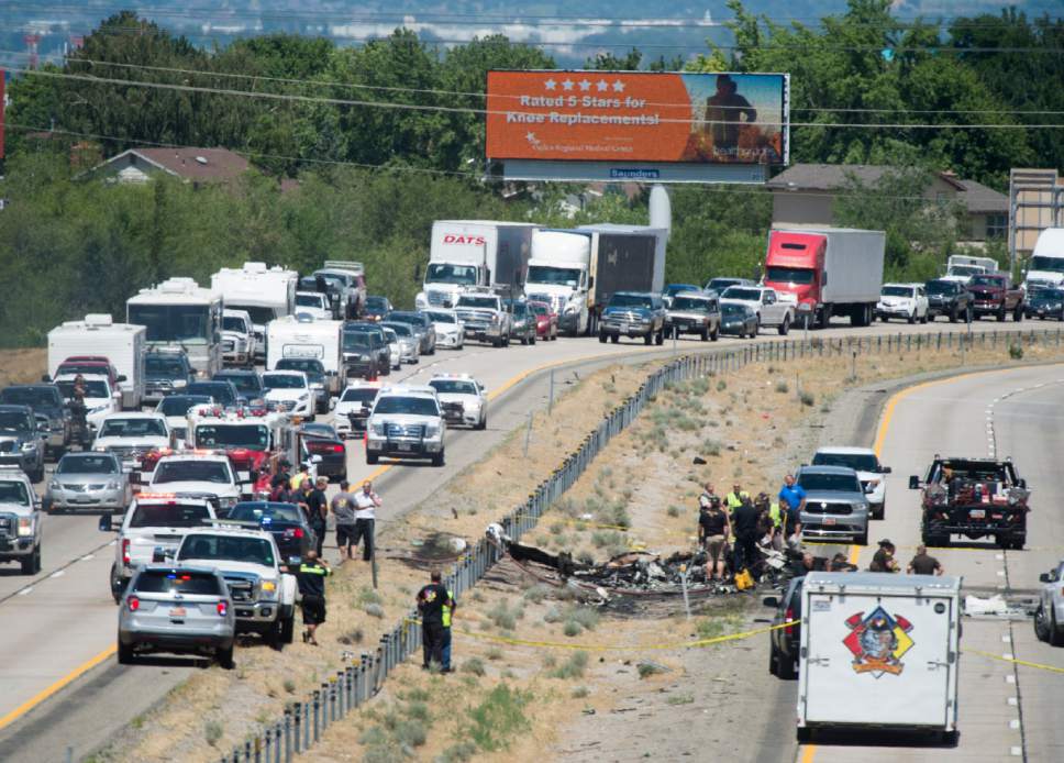 Rick Egan  |  The Salt Lake Tribune

Four people died when their small plane crashed in the median of I-15 near Riverdale around 1:00 pm. The crash closed the freeway to northbound traffic, Wednesday, July 26, 2017.