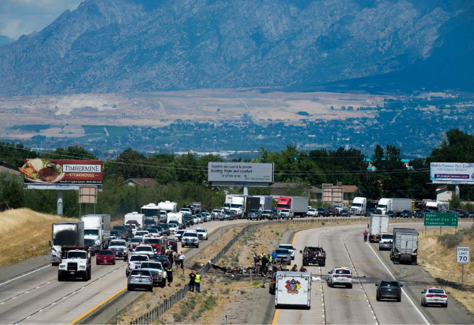 Rick Egan  |  The Salt Lake Tribune

Four people died when their small plane crashed in the middle of I-15 near Riverdale around 1:00 pm. The crash closed the freeway to northbound traffic, Wednesday, July 26, 2017.