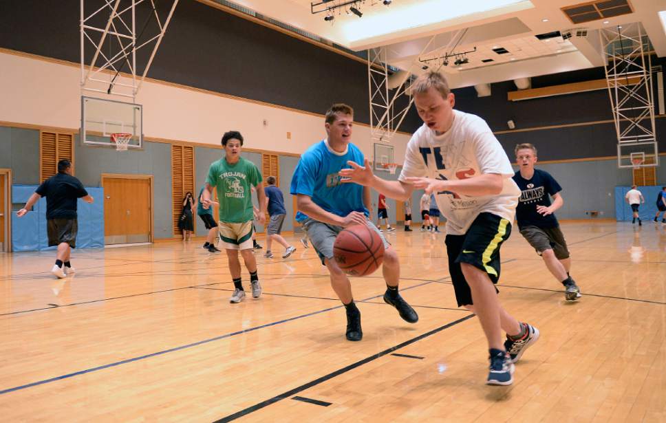 Al Hartmann  |  The Salt Lake Tribune
Missionaries play a game of basketball to keep in shape at the Missionary Training Center in Provo Wednesday July 26.